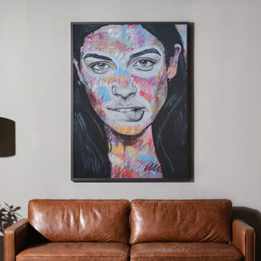 Painted Portrait - Street Art poster, framed above a brown leather couch