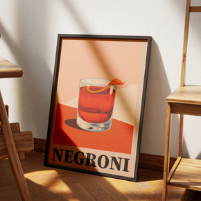 Aperitivo Zeit - Kühler Negroni Poster, am Boden neben einem Stuhl angelehnt